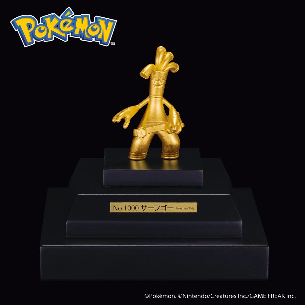 SGC's small K24 pure-gold Gholdengo figurine, shown on its display base